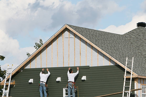 Professional Siding Installation technician working in Alger, OH
